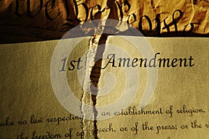 The First Amendment ripped in half and the US Constitution
