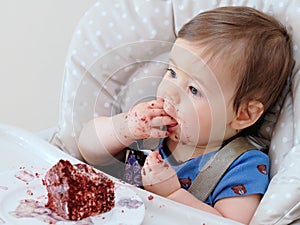 first birthday celebration and first time eating cake for this little toddler boy