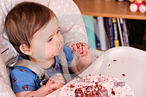 first birthday celebration and first time eating cake for this little toddler boy