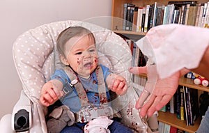 first birthday celebration and first time eating cake for this little toddler boy