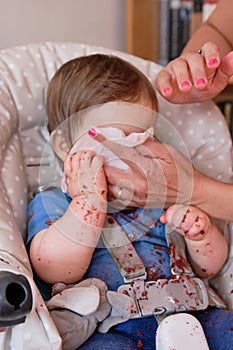 first birthday celebration and first time eating cake for this little toddler boy