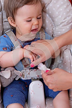 first birthday celebration and first time eating cake for this little toddler boy