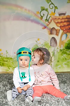 First birthday cute baby boy wearing a St. Patrick`s Day hat