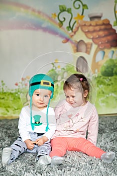 First birthday cute baby boy wearing a St. Patrick`s Day hat