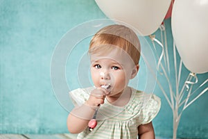 First birthday party. Cute little girl