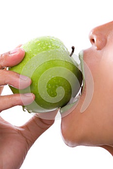 First bite of green apple