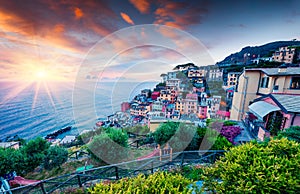 First city of the Cique Terre sequence of hill cities - Riomaggiore. Colorful spring sunset in  Liguria, Italy, Europe. Great