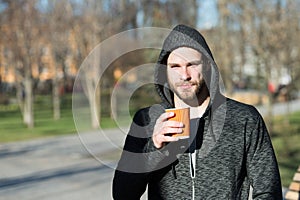 But first coffee. Man morning jog drinks coffee urban background. Taking moment enjoy day. Sportsman relaxing with