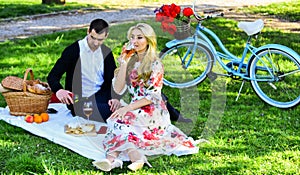 First Date Ideas Guaranteed to Win Her Heart. Enjoying their perfect date. Happy loving couple relaxing in park with