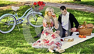 First Date Ideas Guaranteed to Win Her Heart. Enjoying their perfect date. Happy loving couple relaxing in park with