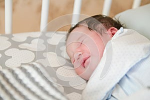 First day of the child at home. Newborn baby sleep first days of life. Cute little newborn child sleeping peacefully