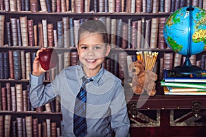First-grader boy with apple