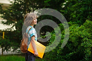 The first grader on a schoolyard.