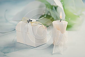 First holy communion or confirmation - candle,  small present and flowers