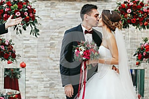 First kiss of just married after the ceremony