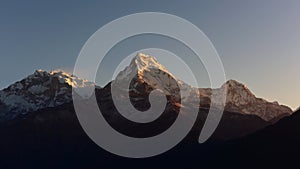 First light of the day hitting Annapurna & Annapurna South as viewed from Poon Hill summit, Nepal