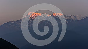 First light hitting Annapurna South and Hiunchuli as viewed from Sarangkot, Nepal