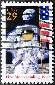 First man on the moon in vintage stamp