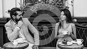 first meet and acquaintances. couple in love. bearded man and woman in cafe.