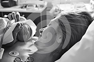 The first moments of mother and newborn after childbirth photo