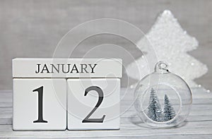 First month of the year, a calendar with numbers and a month, January 12. New Year`s fairy tale as a keepsake