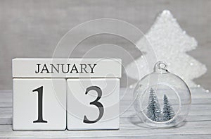 First month of the year, a calendar with numbers and a month, January 13. New Year`s fairy tale as a keepsake