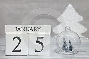First month of the year, a calendar with numbers and a month, January 25. New Year`s fairy tale as a keepsake