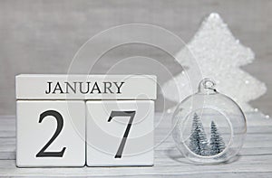 First month of the year, a calendar with numbers and a month, January 27. New Year`s fairy tale as a keepsake
