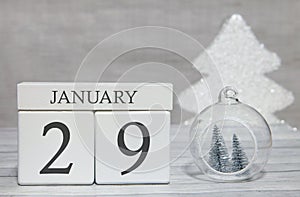 First month of the year, a calendar with numbers and a month, January 29. New Year`s fairy tale as a keepsake
