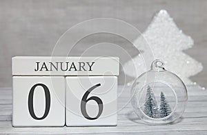 First month of the year, a calendar with numbers and a month, January 6. New Year`s fairy tale as a keepsake