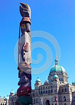 First Nations totem pole in front of Victoria Legislature