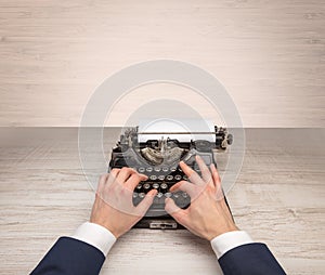 First person perspectve hand writing on an oldschool typewriter