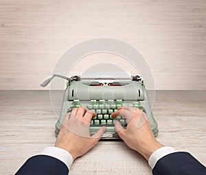 First person perspectve hand writing on an oldschool typewriter