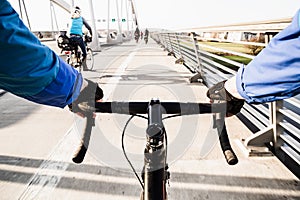 First-person view of cyclist in the city at morning