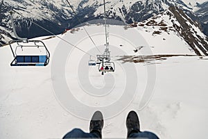 first-person view ski chair lift ropeway at ski resorÐµt
