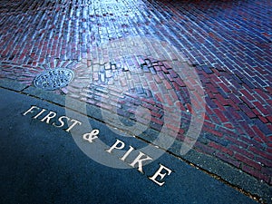 First and Pike Street Seattle Washington Corner Sign Bricks