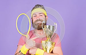 First place. Sport achievement. Tennis champion. Win tennis game. Celebrate victory. Athletic man hold tennis racket and