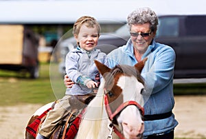First Pony Ride for a Little Boy