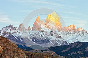 First rays of sun at sunrise over Mount Fitz Roy or Cerro Chalten, Argentina