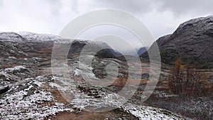 First snow in autumn on Sognefjellet mountain pass in Norway