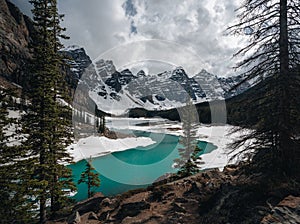 First snow Morning at Moraine Lake in Banff National Park Alberta Canada Snow-covered winter mountain lake in a winter