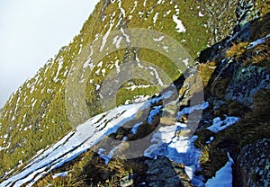 First snow on the Ratikon border alpine mountain massif or Raetikon Grenzmassiv and over the river Rhine valley Rheintal photo