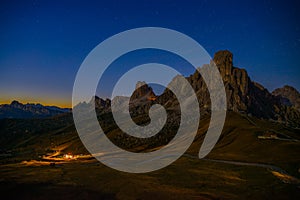 First stars appearing after the sunset at the Giau pass in the dolomites near Cortina