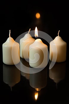 First sunday in advent, candles with black background