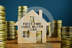 First Time Home Buyer Loan sign on the wooden house