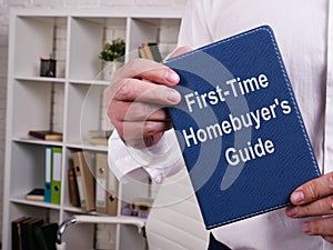 First-Time Homebuyer`s Guide is shown on the conceptual business photo