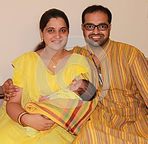 First time Indian (Asian) parent with their baby