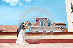 First wedding dance.wedding couple dances on the roof. Wedding day. Happy young bride and groom on their wedding day.
