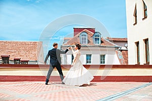 First wedding dance.wedding couple dances on the roof. Wedding day. Happy young bride and groom on their wedding day.