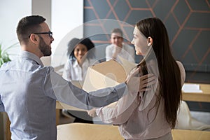 First working day concept, boss welcoming new employee in office